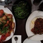 Aerial view of lobster and noodles, duck fried rice and vegetables